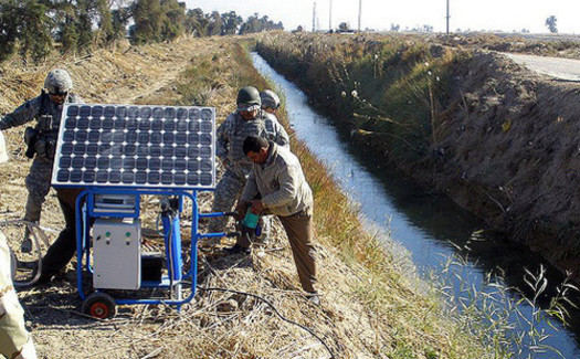 Soldiers in Baghdad install a solar-powered water-filtration system. (U.S. Army/Flickr)