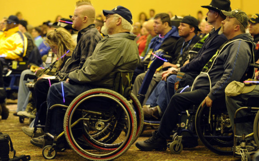 More than 80 percent of those caring for injured veterans are ineligible for Veterans Administration caregiver benefits. (Desiree Palacios/USAF)