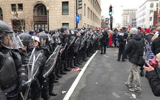 More than 200 people, including half a dozen journalists, were penned in and arrested during the Inauguration Day protests in Washington, D.C. (Anthony Crider/Flickr)