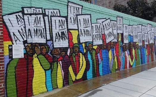 A mural in Memphis depicts the sanitation workers' strike 50 years ago. (Xzelenz/Wikimedia)