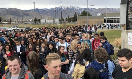 Students walk out of Eastmont High School in Wenatchee on the one-month anniversary of the Parkland, Fla., shooting. (Elli Delzer)