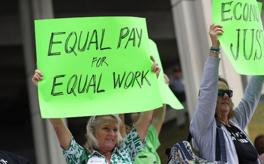 Women make 76 cents for every dollar a man makes in Idaho. (Joe Raedle/Getty Images)