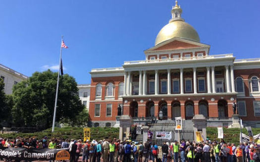 The Boston Poor People's Campaign held a rally at the Massachusetts State House in Boston on Monday, calling for a $15 minimum wage, paid family and medical leave, and a 