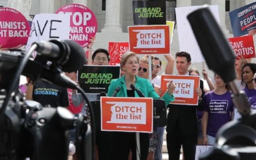 Sen. Elizabeth Warren, on the steps of the Supreme Court, told the crowd, 
