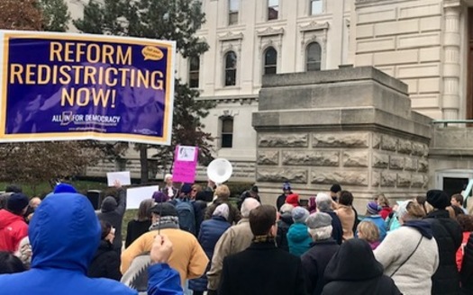 A rally held in November when the new legislators were sworn in called on lawmakers to hand over the power to redraw legislative districts to an independent citizen commission. (Ashley Toruno/ACLU)