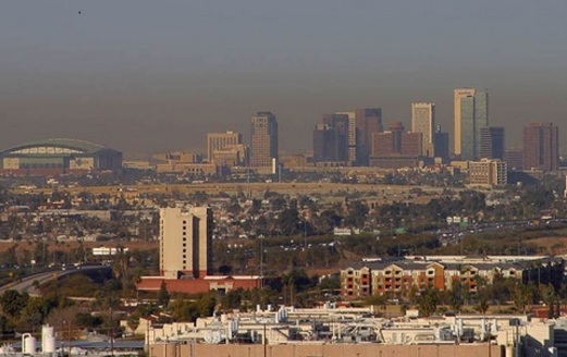 Fine-particulate pollution mixes with smog to blanket downtown Phoenix in haze during a recent winter air inversion. (Wikimedia Commons)