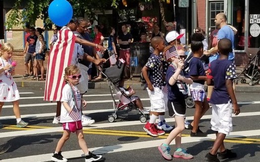 It was more than kids and marching bands at July 4th parades in early presidential nominating states like New Hampshire, as the candidates descended on them to try to make positive impressions on voters. (Mike Licht)