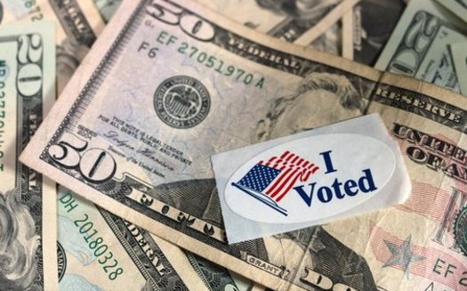 A new report estimates that Americans owe $50 billion in post-conviction fines and fees, which can affect their right to vote. (Dodgerton Skillhause/Morguefile)