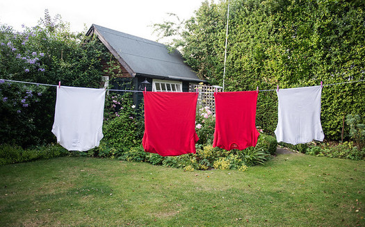 Hang drying clothes is an environmentally friendly alternative to power hungry dryers. (directline.com/Flickr)