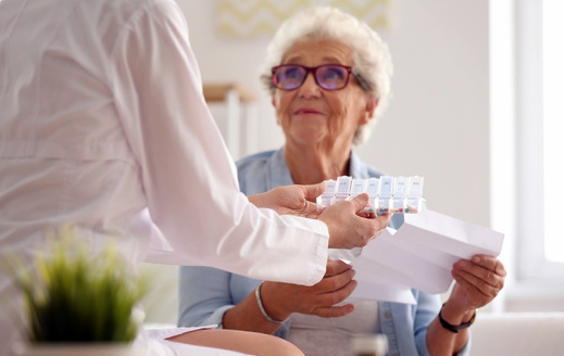 Many Medicare recipients take four or more brand name prescription drugs each month. High costs on a fixed income can force some seniors to choose between medicines or food. (Leonid/AdobeStock)
