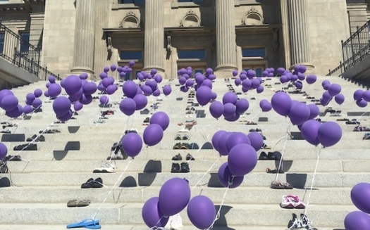 For Overdose Awareness Day, Idahoans place a pair of shoes tied to balloons on the steps of the State Capitol. (Chris Mecham)