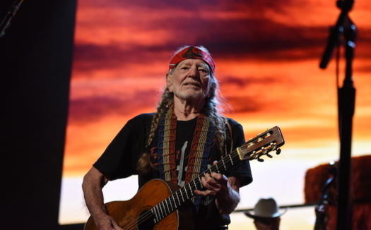 Willie Nelson, shown above at Farm Aid 2018, organized the first Farm Aid along with Neil Young and John Mellencamp in 1985. (Brian Bruner/Bruner Photo)