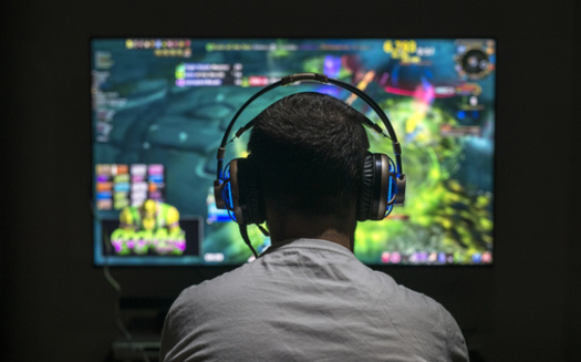 One symptom of an online gaming disorder is when a person continues to play despite negative consequences in their family, school or social life. (Adobe Stock)