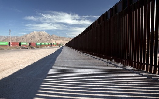 The U.S. Supreme Court will decide whether to review lower court rulings that allow the Trump administration to waive environmental laws for border-wall construction, including a 180-mile stretch in New Mexico. (ArtueoM/Adobe Stock) 