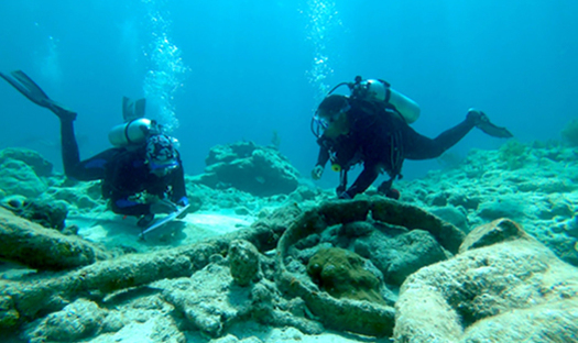 Divers Rebecca Hunter-Wimberley, left, and Ayeta Heatley recording in situ (meaning 