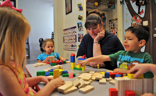 About 1,500 Nebraska parents, mostly unmarried mothers, would start working if they knew they'd<br />be able to obtain a child-care subsidy. (Aubrey Robinson/USAF)