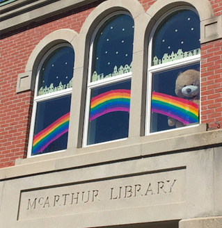 This rainbow was painted by a staff member and her two daughters shortly after the McArthur Library closed to the public on March 16. Buster the Bear is a new addition as well, looking out on Biddeford's Main Street. (McArthur Library)