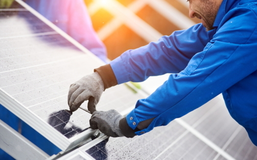 Some of the new solar farms in Virginia are being constructed by a company that the United Nations says has exploited Palestinian natural resources overseas. (Adobe Stock)