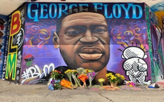 George Floyd murals, such as this one in Milwaukee, have surfaced across the globe following protests over his killing by Minneapolis police. (Graham Kilmer)