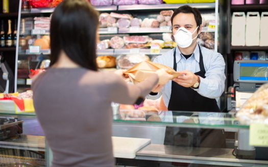 The United Food and Commercial Workers estimated that more than 9,000 grocery store workers in the United States were infected with the coronavirus as of May. (Adobe stock)