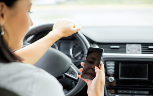 South Dakota's Department of Public Safety says 827 crashes across the state last year were attributed to distracted driving with an electronic device. (Adobe Stock)