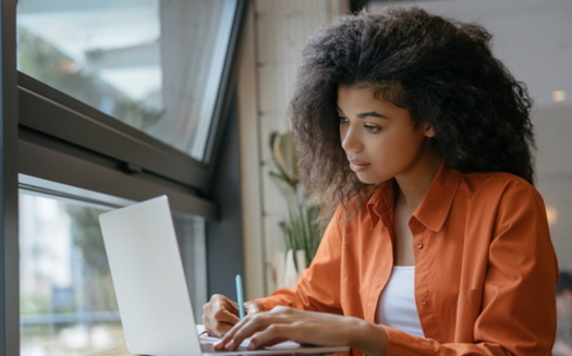 A new survey shows Black and Latino students in Virginia are twice as likely as white students not to have a computer in the home. (Adobe stock)