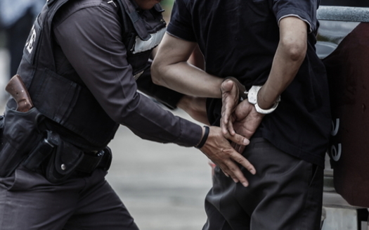 Some 60% of Marylanders in a new survey said they support laws banning police from using chokeholds when making an arrest. (Adobe stock)