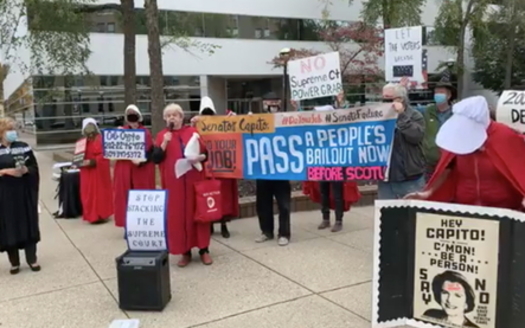 Members of a West Virginia NOW group rally in Charleston, saying the Senate should have waited until after the election to push through a Supreme Court nominee. (Kanawha Valley NOW Facebook page)