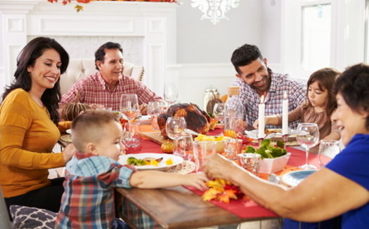 Experts advise using compassion if the conversation veers into difficult political topics around this year's holiday dinner table. (Adobe Stock)