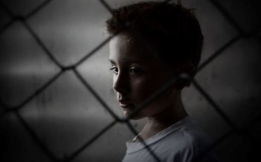A human rights report gives Illinois 3.5 points out of 10 for how kids are treated in the criminal-justice system. (AdobeStock)