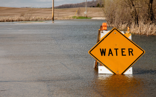 A new Wisconsin report says increases in precipitation and temperatures are likely to drive more extreme weather events, such as floods and heatwaves. (Adobe Stock)