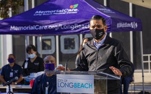 Long Beach Mayor Robert Garcia addresses people at one of the city's vaccine clinics. Long Beach has a large LGBTQ+ community. (City of Long Beach)