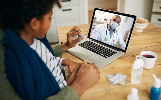 Nearly 70% of voters say they've used telemedicine services during the pandemic, and are likely to do so again. (Drazen/Adobe Stock)