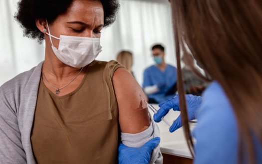 According to APM Research Lab, fewer than 9% of Blacks in the United States have received at least one COVID vaccination, compared with more than 16% of Caucasians. (Adobe Stock)