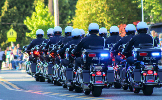 A coalition representing more than 14,000 police officers are giving the thumbs up to many reform efforts in Washington state. (Diego Gomez/Adobe Stock)
