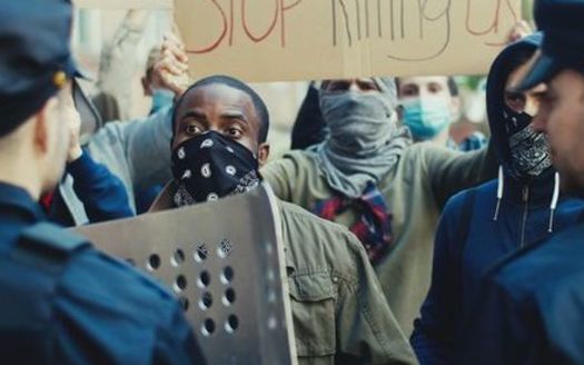 Racial-justice protests reached a global scale last year, but in some states and cities, how police respond to demonstrators remains a thorny issue. (Adobe Stock)