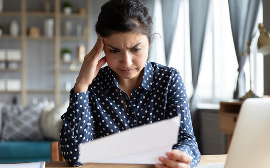 People who have medical debt or trouble paying medical bills are more likely to have continued health issues, from high blood pressure and mental health concerns to a shorter life expectancy.(Adobe Stock)
