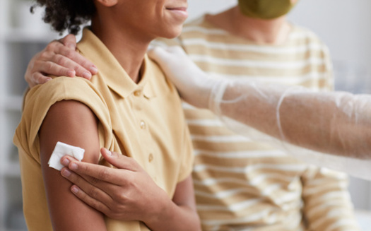Massachusetts has launched efforts to reduce racial and socioeconomic disparities in vaccination rates, but while some communities' rates are through the roof, others still lag behind.  (Seventyfour/Adobe Stock) 