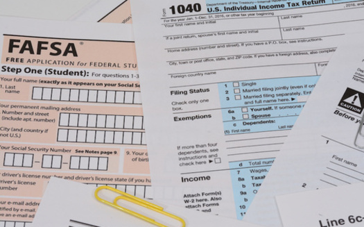 Help to fill out a FAFSA form for federal student aid is one example of now Missouri community partnerships support young people pursuing education and careers as they age out of the foster care system. (Bill Doss/Adobe Stock)
