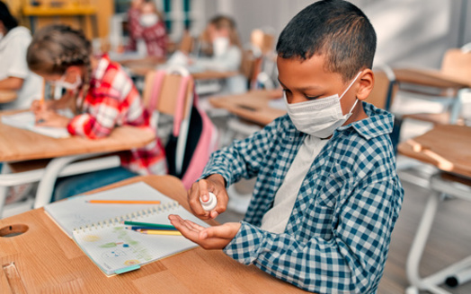 In addition to recommending teachers, students and school staff member mask up indoors this fall, new CDC guidelines recommend even vaccinated people wear masks in areas with high COVID case numbers. (Vasyl/Adobe Stock)