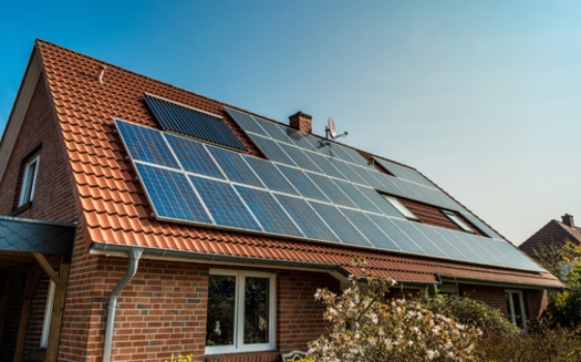 A new report finds programs like the Low-Income Home Energy Assistance Program and the Weatherization Assistance Program could eventually transform energy-bill assistance into self-reliance through investments in local solar energy. (Adobe Stock)