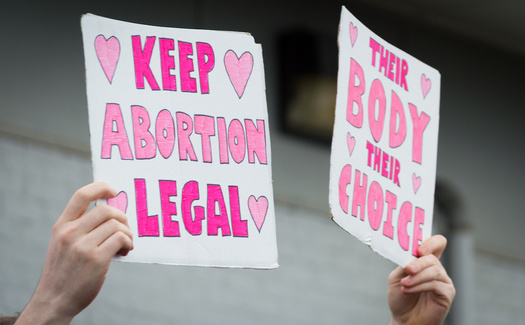 A new report spotlights the economic impacts of limiting a woman's right to safe and legal abortion. (Adobe Stock)