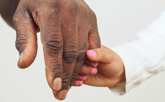 Day 2 Day Dads, a Raleigh-based fatherhood program, helps men reconnect with their children after incarceration. (Adobe Stock)