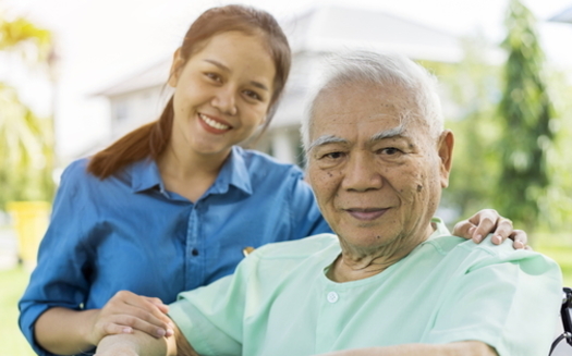 Across the nation, family caregivers provide $470 billion in unpaid care each year so loved ones can live independently in their homes, according to AARP research. (Adobe Stock)