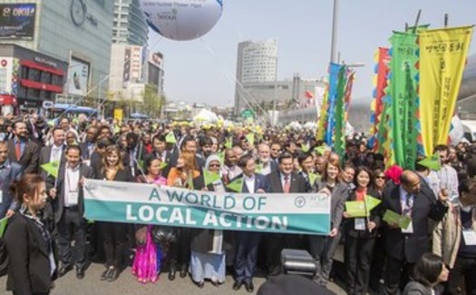 Local government representatives marched on World of Action Day at the 2015 World Congress of Local Governments for Sustainability in Seoul, South Korea. Many are headed to Scotland this week.(ICLEI USA)