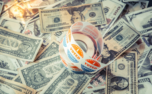 Groups looking to rein in money in politics hope to pass campaign-finance limits before the 2024 election. (Joaquin Corbalan/Adobe Stock)