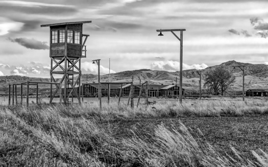 Heart Mountain internment camp's 10,000 Japanese American residents were held in a one-square-mile area surrounded by nine towers staffed by armed military police. (Adobe Stock)