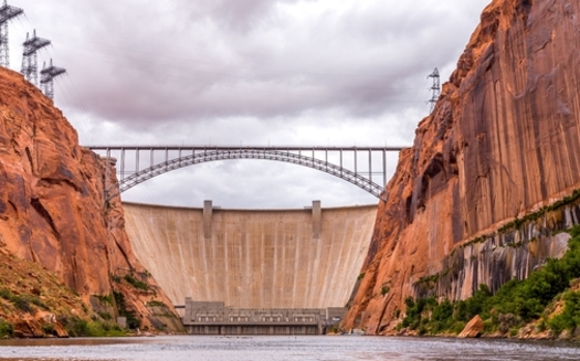 Glen Canyon Dam is 710 feet tall and impounds the Colorado River to form the 26-million-acre-foot Lake Powell reservoir. (mariakray/Adobe Stock)