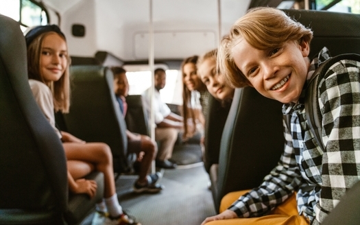 Many Arizona public school districts may have to cut back or eliminate transportation or other programs if state legislators force year-end budget cuts. (Drobot Dean/Adobe Stock)