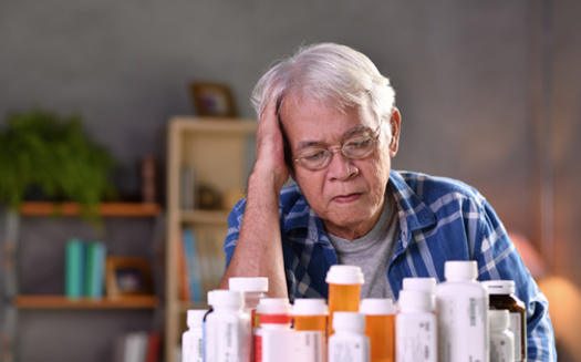 More than half of Massachusetts residents making less than $100,000 a year are somewhat or very worried about affording prescription drugs. (amenic181/Adobe Stock)